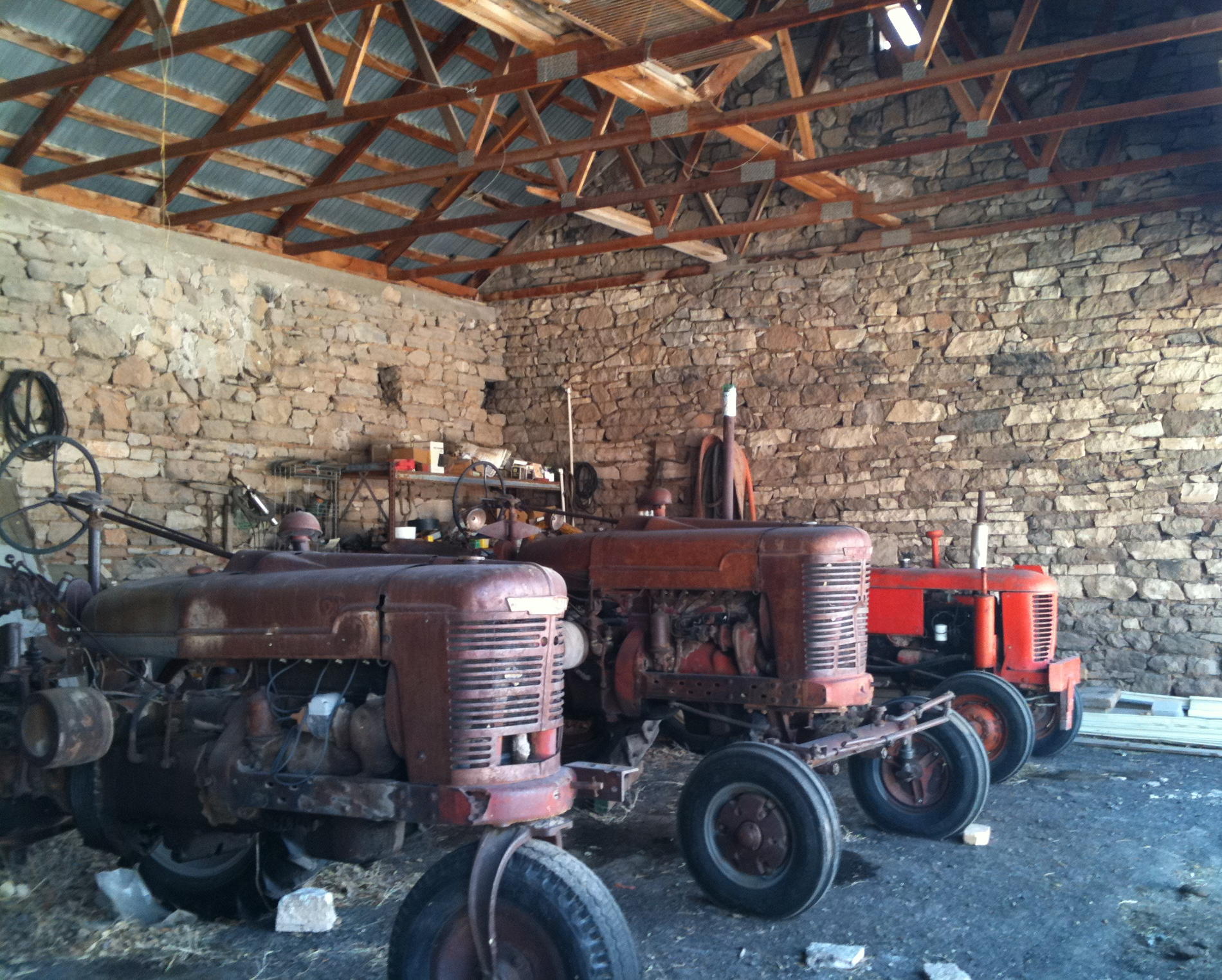 Antique tractors in the stone barn on the Terry Ranch