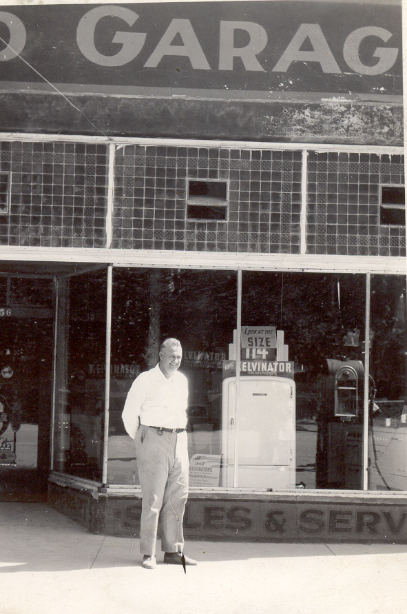 Melvin Cox in front of the Arrowhead Garage 