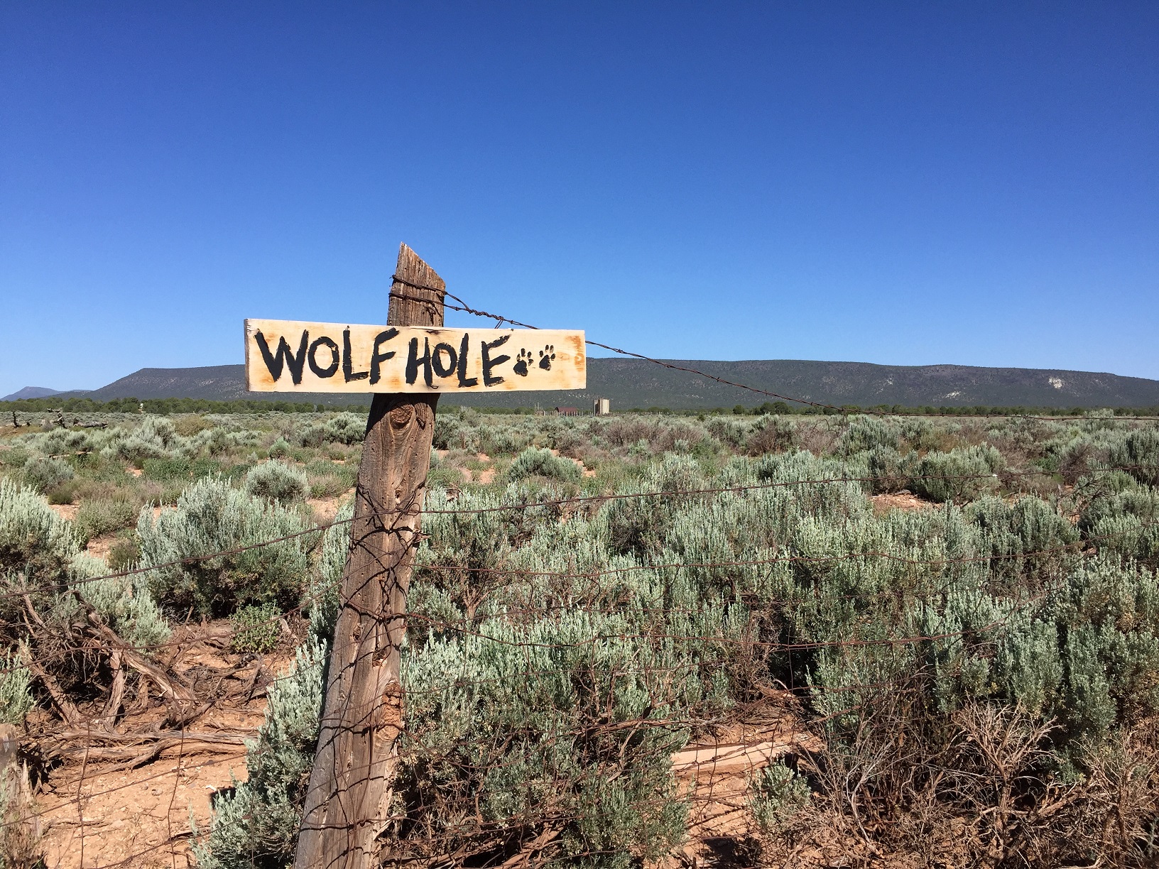The Wolf Hole sign and property