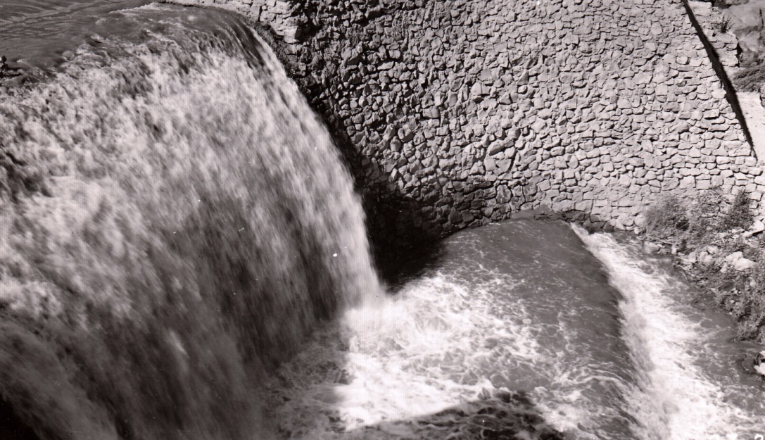 A portion of the Shem Dam spillway carrying spring runoff
