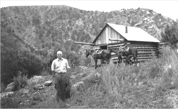 Gus Larson with his newly built cabin